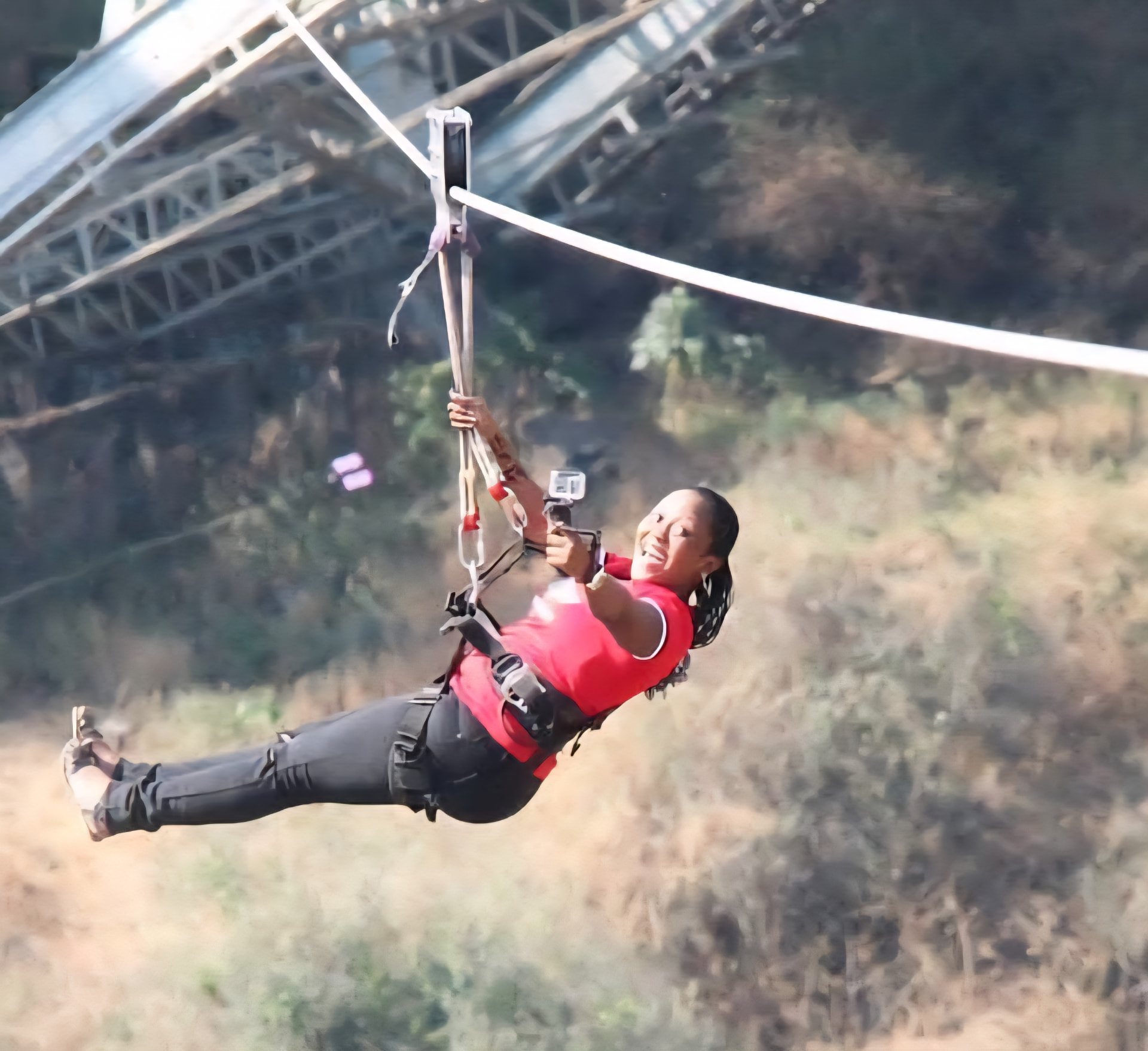 Guest zip-lining across the Batoka Gorge at Victoria Falls