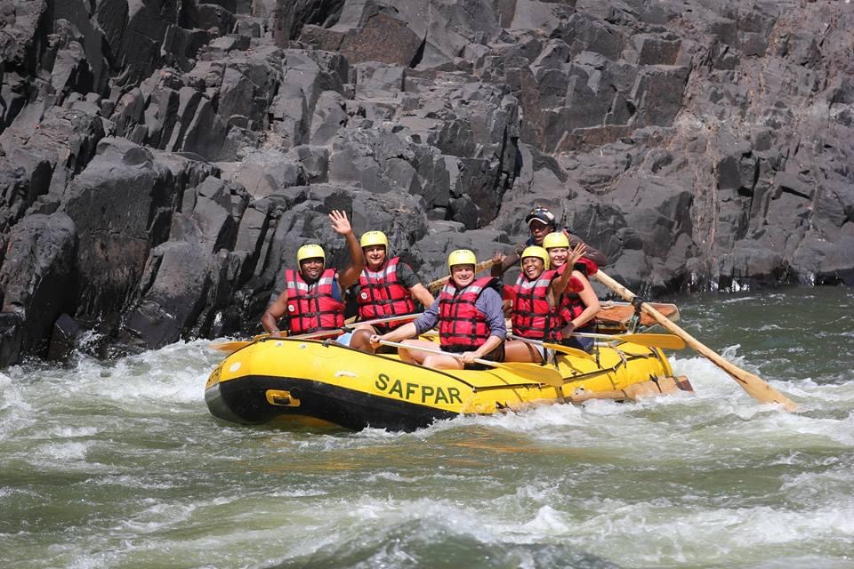 Guests white-water rafting a rapid on the Zambezi River below Victoria Falls